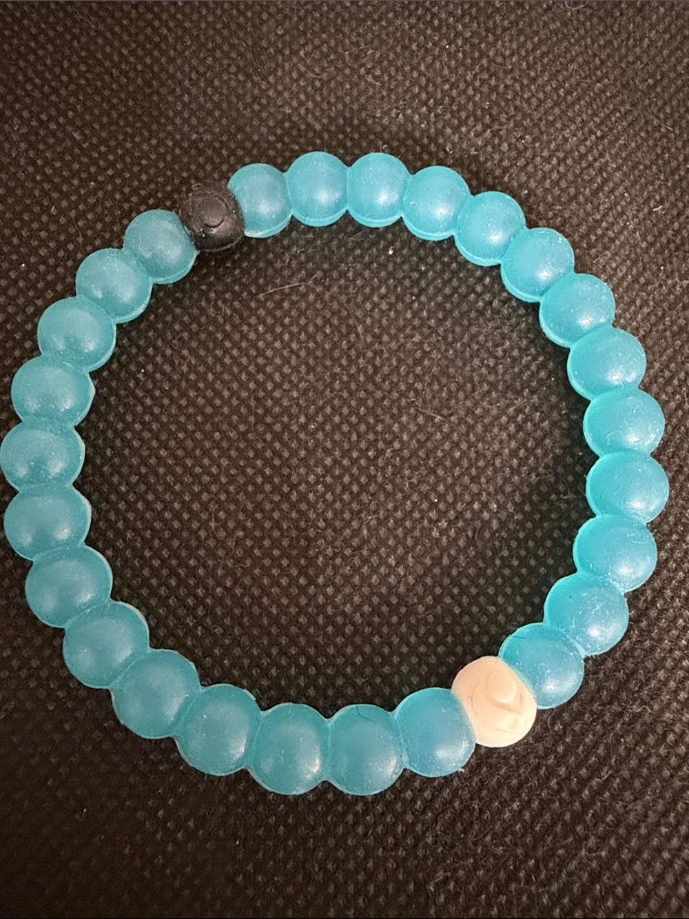 Lokai Water Silicone Bracelets featuring blue beads